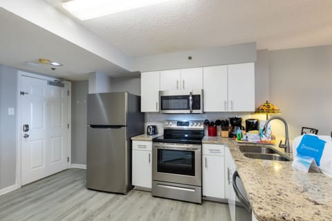 Family Condo, 2 Bedrooms, Balcony, Beach View | Private kitchen | Fridge, microwave, oven, stovetop