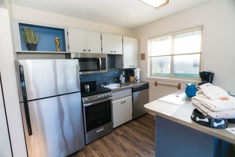 Suite, Two Bedrooms, 1st Floor (Dog-Friendly) | Private kitchen | Microwave, coffee/tea maker, paper towels