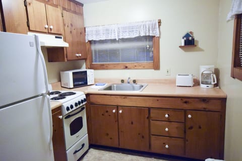 Small 2 Bedroom w/ 1 Full Bed, 2 Twin Beds & 1 Sleeper Sofa | Private kitchen | Full-size fridge, microwave, stovetop, coffee/tea maker