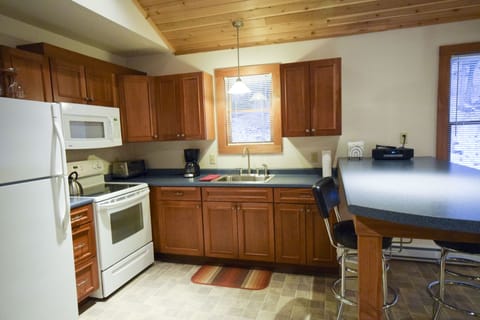 One Bedroom w/ 1 King Bed (Pets not allowed) | Private kitchen | Full-size fridge, microwave, stovetop, coffee/tea maker