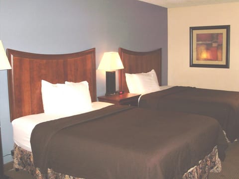 Deluxe Room, 2 Queen Beds | In-room safe, desk, blackout drapes, iron/ironing board