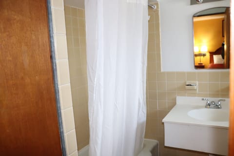 Room, 2 Queen Beds | Bathroom | Combined shower/tub, deep soaking tub, free toiletries, hair dryer