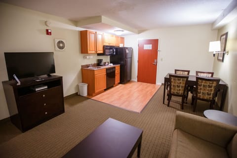 Suite, 1 King Bed, Smoking | Private kitchen | Full-size fridge, microwave, stovetop, dishwasher