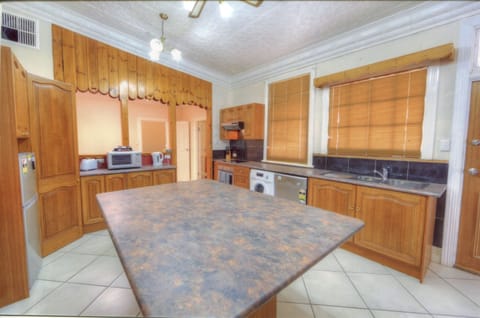 Chloride St Luxury Cottage (3 Bedrooms) | Private kitchen | Fridge, microwave, coffee/tea maker, electric kettle