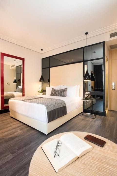 Junior Suite, Balcony | Premium bedding, minibar, in-room safe, desk