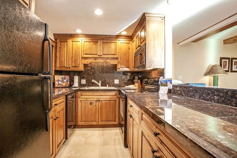 Condo, 1 Bedroom | Private kitchen | Full-size fridge, microwave, oven, stovetop