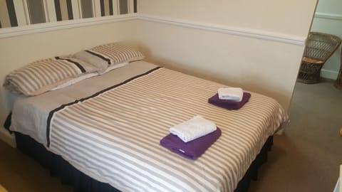 Family Room, Ensuite | Iron/ironing board, travel crib, free WiFi, bed sheets