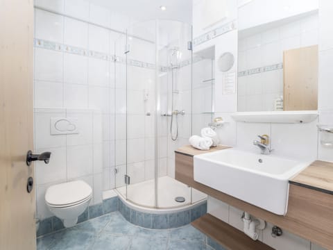 Eco-friendly toiletries, hair dryer, bathrobes, towels