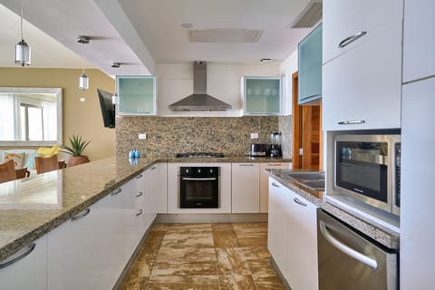 Signature Condo, 2 Bedrooms | Private kitchen | Full-size fridge, microwave, oven, stovetop