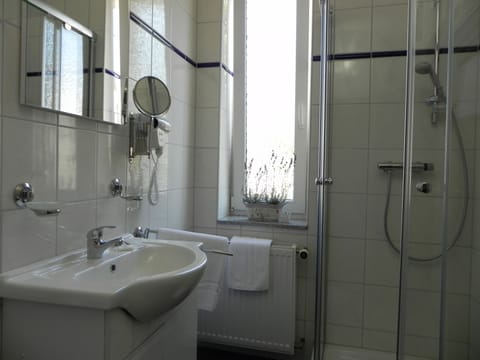 Shower, free toiletries, hair dryer, towels