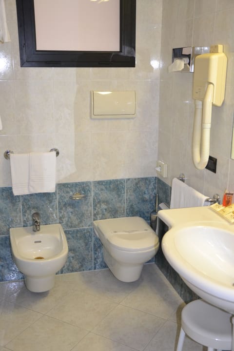 Deep soaking tub, free toiletries, hair dryer, bidet