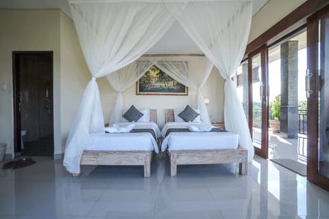 Deluxe Double or Twin Room | Minibar, in-room safe, desk, blackout drapes