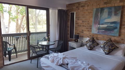 Queen Room | Blackout drapes, iron/ironing board, free WiFi, bed sheets