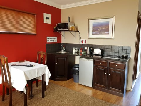 Superior Studio Suite, Kitchen, Sea View | Private kitchenette | Fridge, microwave, coffee/tea maker, electric kettle