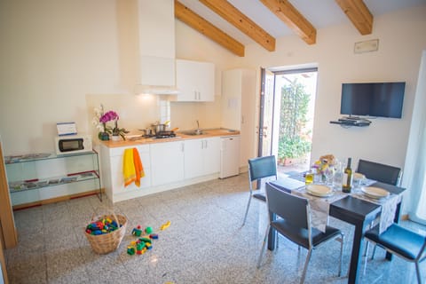 Apartment, 1 Queen Bed with Sofa bed, Garden View | Shared kitchen | Full-size fridge, microwave, stovetop, espresso maker