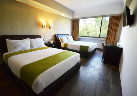 Executive Quadruple Room | Premium bedding, minibar, in-room safe, free WiFi