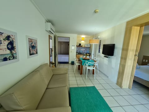 Superior Apartment, Multiple Beds | Living area | Flat-screen TV, table tennis