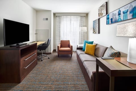 Suite, 1 Bedroom | Living area | 42-inch Smart TV with satellite channels, TV, Netflix