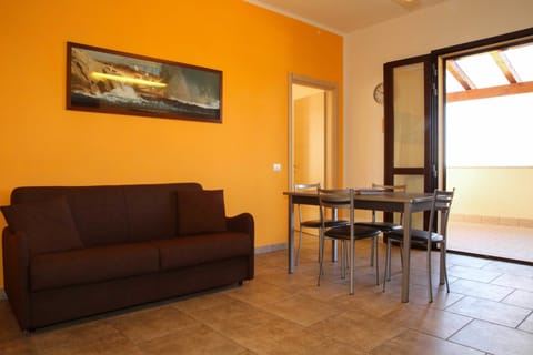 Family Apartment, 1 Bedroom, Terrace, Sea View | Living area | 32-inch flat-screen TV with digital channels, TV