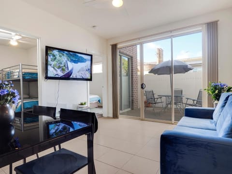 Standard Apartment, 2 Bedrooms | Living room | Flat-screen TV, DVD player