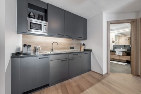 Classic Suite, 2 Bedrooms | Private kitchenette | Full-size fridge, microwave, stovetop, dishwasher