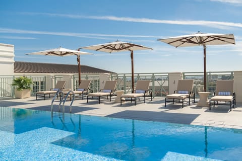 Outdoor pool, cabanas (surcharge), pool umbrellas