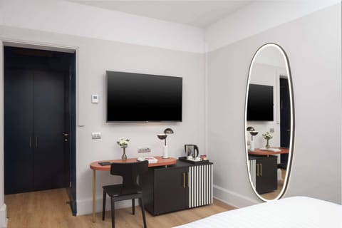 Minibar, in-room safe, individually decorated, desk