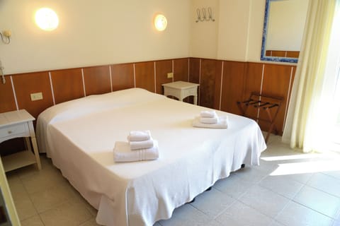 Double or Twin Room, Balcony | In-room safe, desk, free WiFi, bed sheets