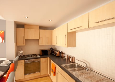 Apartment, 2 Bedrooms | Private kitchen | Full-size fridge, microwave, oven, coffee/tea maker