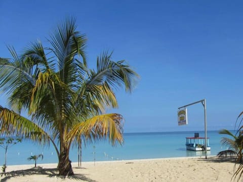 Private beach, white sand, snorkeling, water skiing