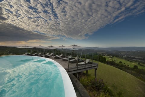 Indoor pool, outdoor pool, pool umbrellas, sun loungers