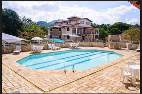 2 outdoor pools, pool umbrellas, sun loungers