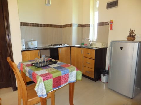 Apartment, 1 Bedroom | Private kitchen | Fridge, microwave, coffee/tea maker, electric kettle