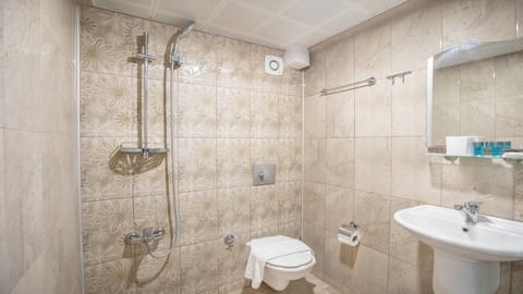 Shower, free toiletries, hair dryer, slippers