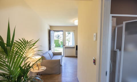 Superior Apartment | Living area | 42-inch Smart TV with satellite channels