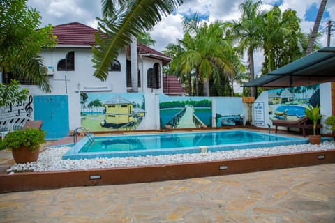 Outdoor pool, sun loungers, lifeguards on site