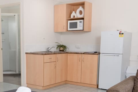 Suite, Multiple Beds, Non Smoking | Private kitchen | Fridge, microwave, coffee/tea maker, electric kettle