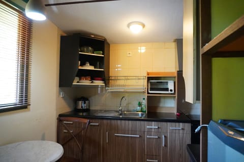 Superior Studio | Private kitchen | Fridge, electric kettle