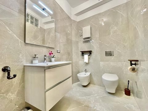 Exclusive Apartment, 1 Bedroom, Terrace | Bathroom | Shower, rainfall showerhead, free toiletries, hair dryer