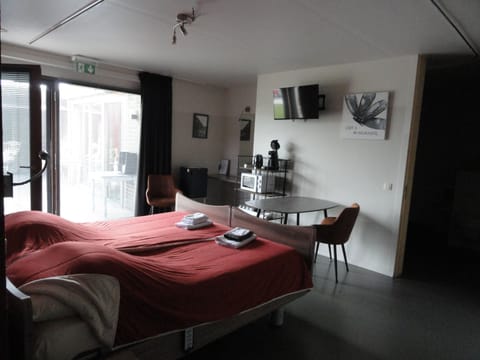 Family Quadruple Room, Accessible, Garden Area | In-room safe, desk, soundproofing, free WiFi