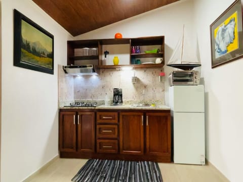 Premier Room, 1 Bedroom, Garden View | Private kitchen | Dining tables