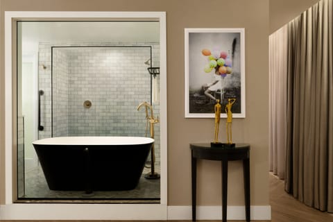 Patio Suite | Bathroom | Designer toiletries, hair dryer, bathrobes, slippers