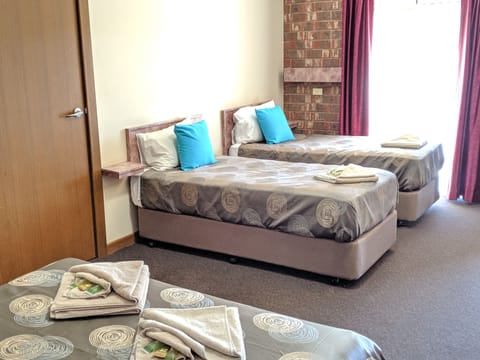 Queen Plus Single Room | 1 bedroom, desk, iron/ironing board, free WiFi