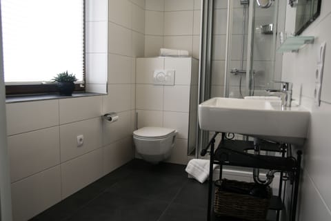 Shower, free toiletries, hair dryer, towels