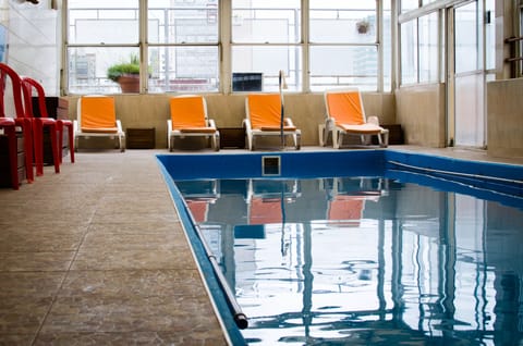 Indoor pool, sun loungers