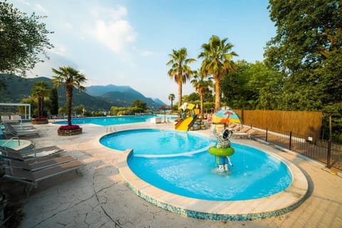 Seasonal outdoor pool, open 10 AM to 6:00 PM, pool umbrellas