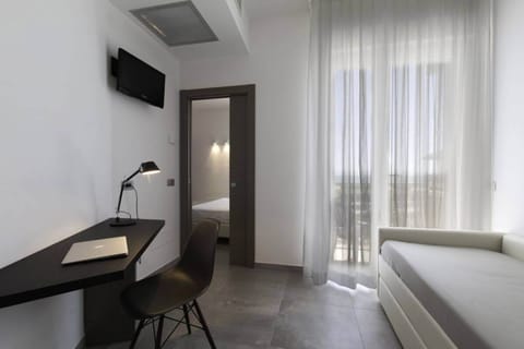 Quadruple Room, 2 Bedrooms | Minibar, in-room safe, desk, free WiFi