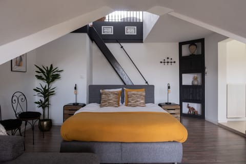 Family Quadruple Room | Minibar, individually decorated, desk, laptop workspace