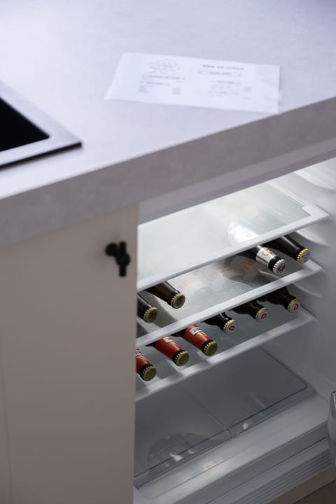 Family Quadruple Room | Private kitchen | Fridge, microwave, stovetop, coffee/tea maker