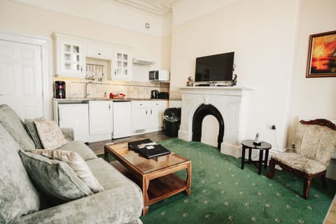 Premium Apartment, 2 Bedrooms, Sea View | Living area | Flat-screen TV, toys